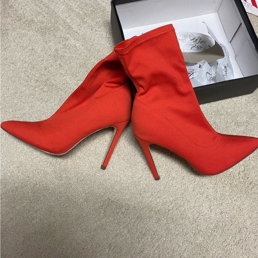 Red heeled boots Size 7.5 Worn ONcE.